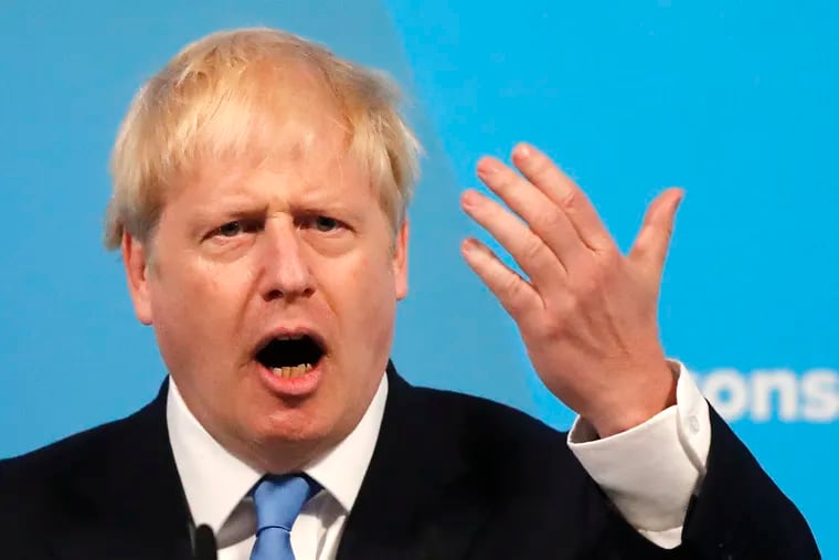 Boris Johnson gestures as he speaks after being announced as the new leader of the Conservative Party in London, Tuesday, July 23, 2019. Brexit champion Boris Johnson won the contest to lead Britain's governing Conservative Party on Tuesday, and will become the country's next prime minister.