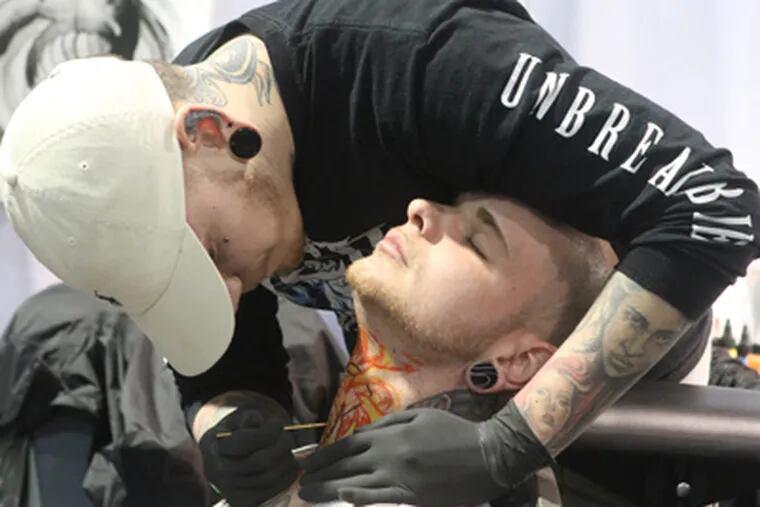 Tattoo artists a big draw at Convention Center