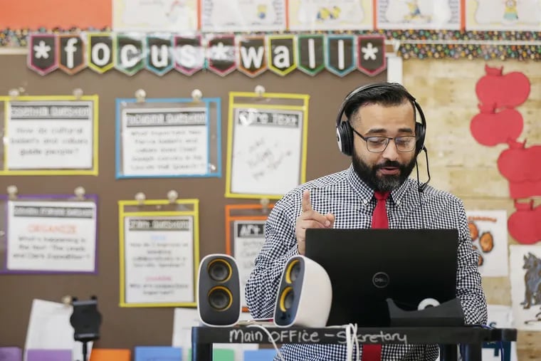 Angel Santiago virtually teaches a language arts lesson to a class of fifth graders at Loring Flemming Elementary in Blackwood, N.J., on Wednesday, Oct. 14, 2020. The New Jersey Department of Education named him the state's 2020-21 Teacher of the Year.