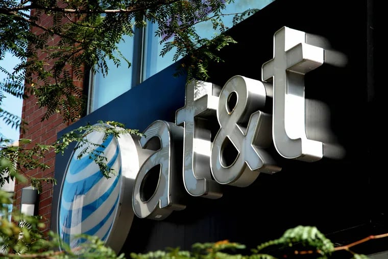 AT&T signage is displayed at 17th Street and Avenue of the Americas in New York.