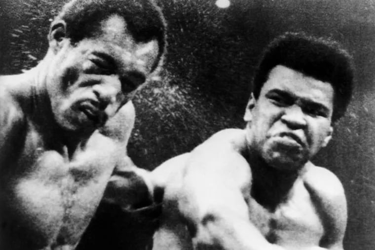 Muhammad Ali, right, lands a blow to the head of Ken Norton during a match in Inglewood, Calif., in September 1973.