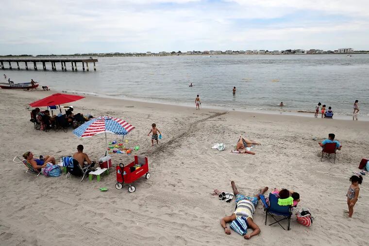 The scene on the Caspian Avenue beach in Atlantic City, where water temperature readings have had their lows and highs this summer.