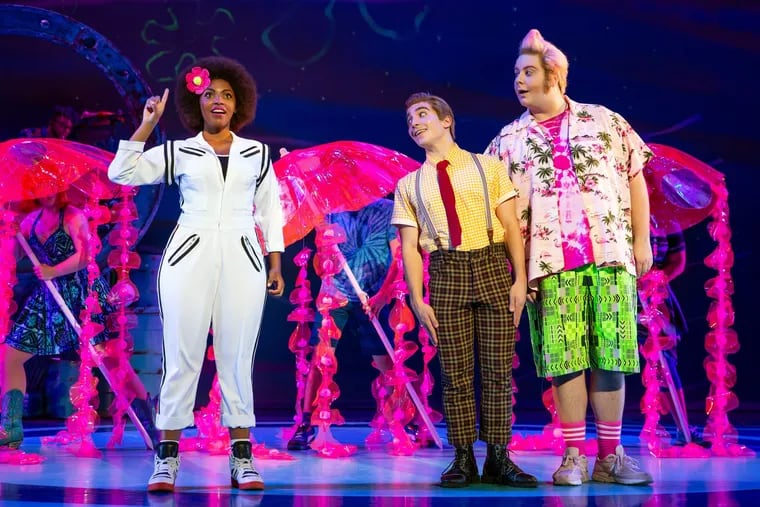 Lorenzo Pugliese (center) is SpongeBob Square Pants in "SpongeBob The Musical." Daria Pilar Redus (left) plays Sandy Cheeks and Beau Bradshaw is Patrick Star.