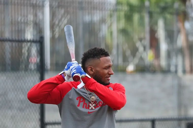 Phillies outfielder Johan Rojas working on his batting stroke last month during spring training at BayCare Ballpark in Clearwater, Fla.