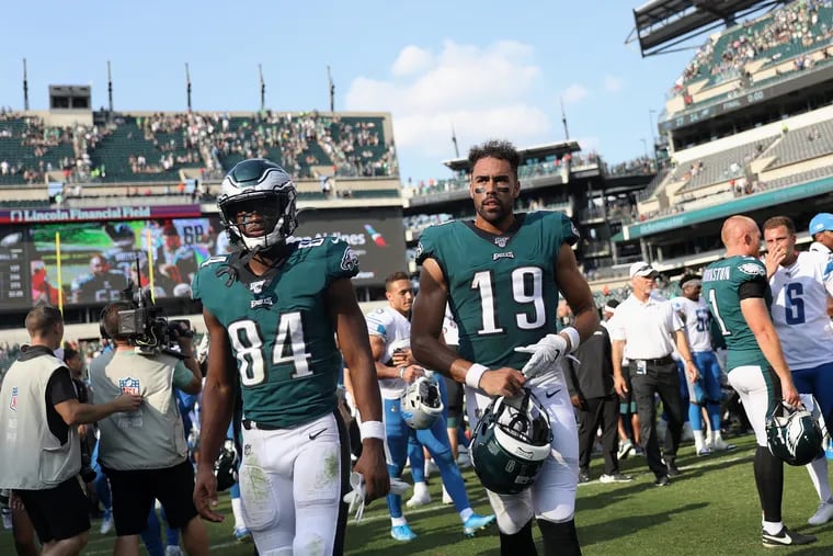 Eagles wide receivers Greg Ward (84) and J.J. Arcega-Whiteside (19) leave the field after a game against the Detroit Lions at Lincoln Financial Field in South Philadelphia on Sunday, Sept. 22, 2019. The Eagles lost 27-24.