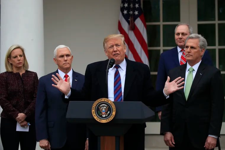 President Donald Trump speaks in the Rose Garden of the White House in Washington, after a meeting with congressional leaders on border security, as the government shutdown continues Friday, Jan. 4, 2019, as Homeland Security Secretary Kirstjen Nielsen, Vice President Mike Pence, House Minority Whip Steve Scalise of Louisiana, and House Minority Leader Kevin McCarthy of California listen. (AP Photo/Manuel Balce Ceneta)