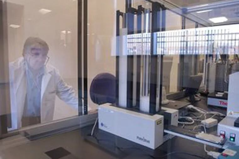 AstraZeneca associate scientist Dolores Gallagher kept an eye on a replicator as samples were prepared in 2004 at a facility in Delaware. AstraZeneca has its U.S. headquarters and about 4,500 employees near Wilmington.