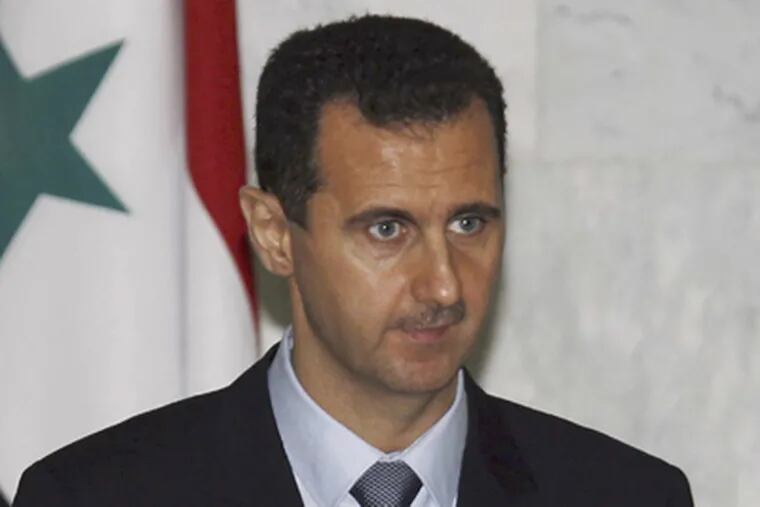 Syrian leader Bashar Assad isn't stepping down for democracy. (Associated Press / Shaam News Network)