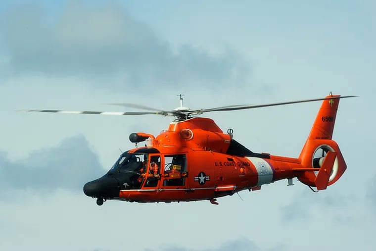 A Coast Guard MHC-65C Dolphin helicopter.