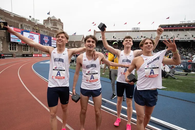 Villanova's team of (from left to right) Sean Donoghue, Liam Murphy, Charlie O’Donovan, and Marco Langdon celebrates its win in the college men's 4xMile Championship of America.