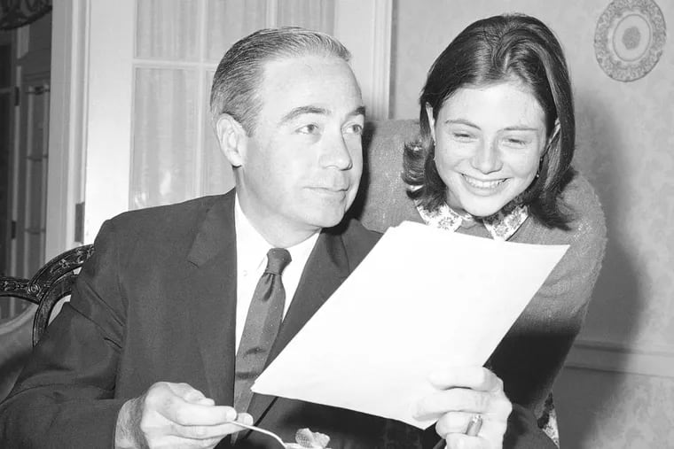 Gov. William W. Scranton and 18-year-old daughter Susan check a rough draft of a speech over breakfast on June 12, 1964.