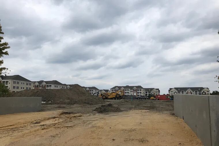 Crews are clearing the site at Garden State Plaza in Cherry Hill that where plans are underway to add three new stores, including Trader's Joe and a restaurant.