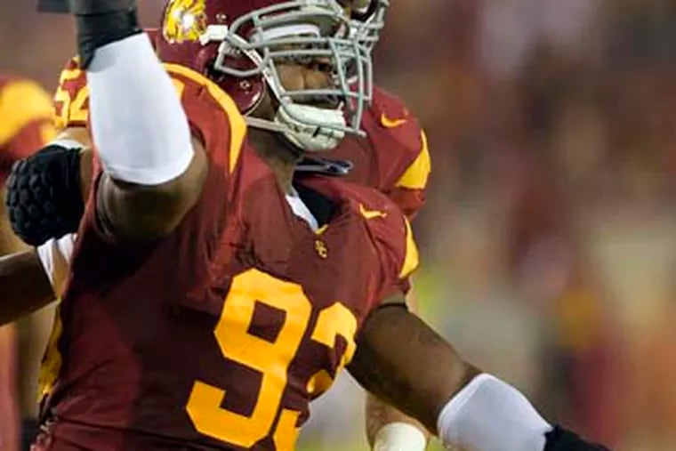 Southern California defensive end Everson Griffen is a popular projection for the Eagles one month before the NFL draft. Here, he was celebrating a sack against Washington State in September 2009.
