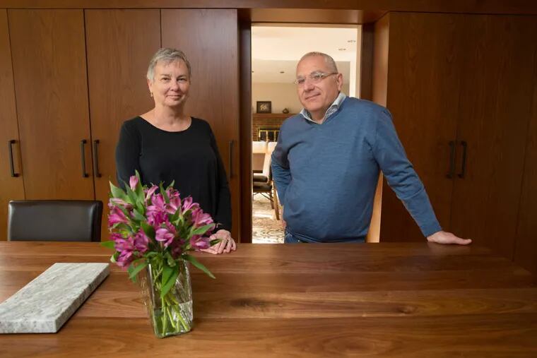 Homeowner Karen Getzen, left, and architect Elie Antoine Atallah, AIA, in Getzen&#039;s newly renovated kitchen with custom cabinets in Chestnut Hill.