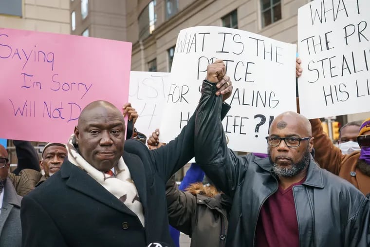 December 2021 photo of civil rights attorney Ben Crump (left) and Christopher Williams (right) shown here at a news conference outside the Criminal Justice Center to announce a lawsuit on Williams' behalf against the City of Philadelphia, police and prosecutors. Williams was exonerated and released from prison in February 2021 after more than 25 years on death row.