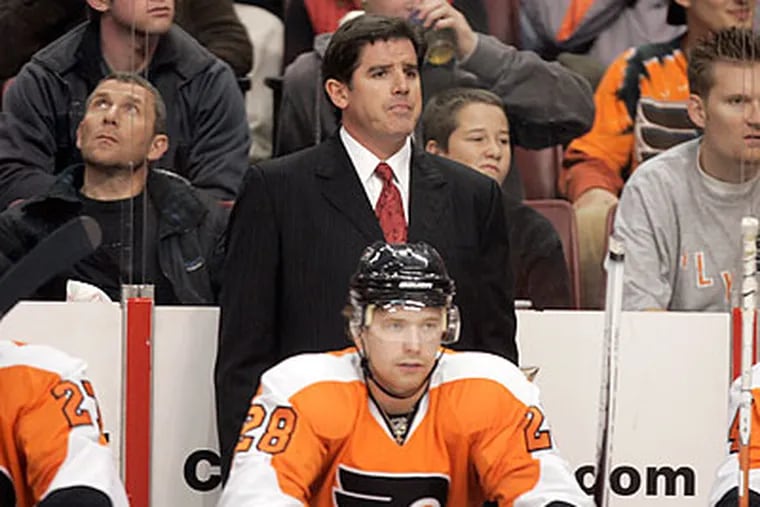New Flyers coach Peter Laviolette worked the team extra hard at practice yesterday in order to express his displeasure in their excessive penalties in Tuesday night's win. (David Swanson/Staff Photographer)