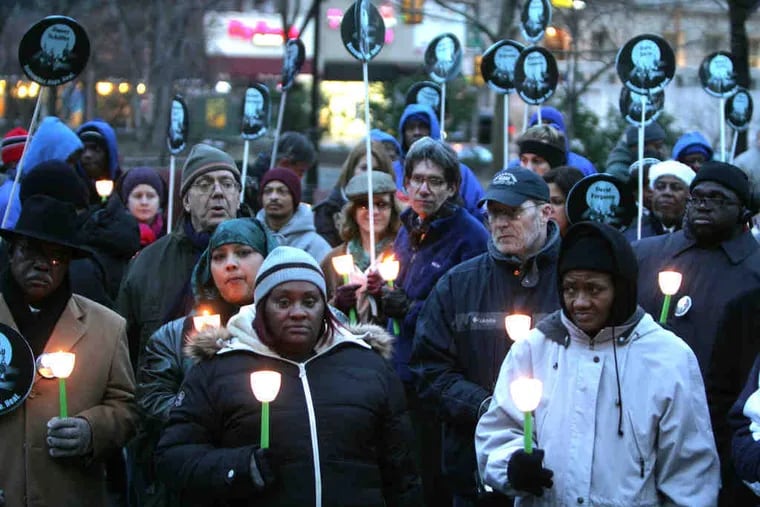 With candles and signs, activists mark Homeless Memorial Day in LOVE Park. Project HOME's Sister Mary Scullion told them, &quot;We have to get involved more . . . in our civic engagement.&quot;