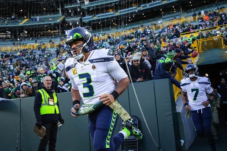 Seattle quarterback Russell Wilson take the field for a game against the Green Bay Packers on Sunday, Nov. 14.