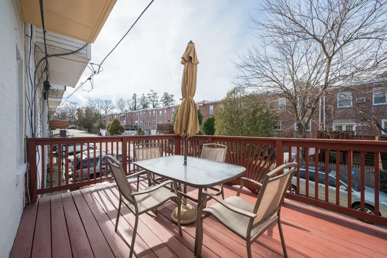 The outdoor deck is easily accessible from the dining room for cookouts.
