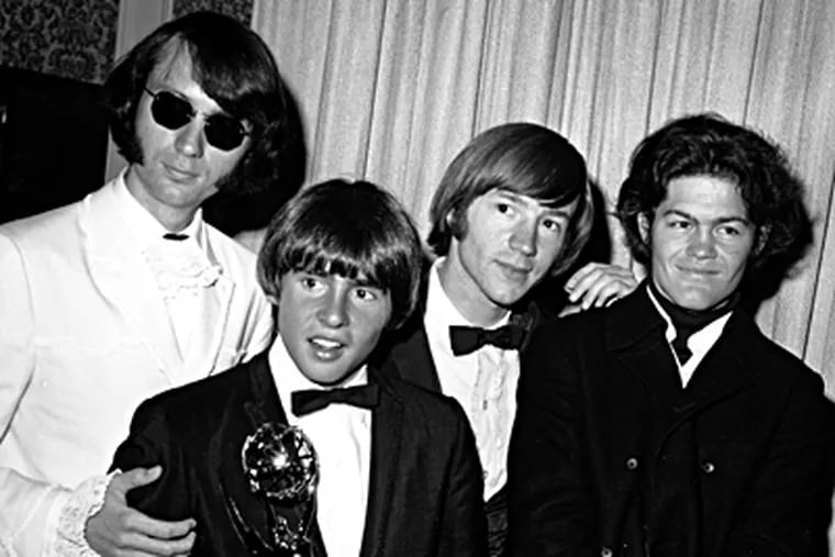 The Monkees - (from left) Mike Nesmith, Davy Jones, Peter Tork, and Micky Dolenz - with their Emmy Awards in 1967. Mr. Tork died Thursday at age 77.