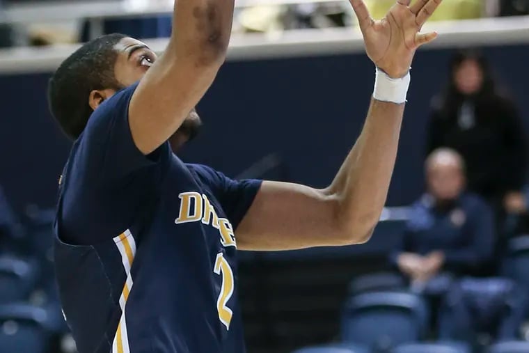Drexel's Jarvis Doles goes up for a shot against Towson   during the second half at The Daskalakis Athletic Center in Philadelphia  Thursday,  January 17, 2019. Drexel beats Towson 72-66. STEVEN M. FALK / Staff Photographer