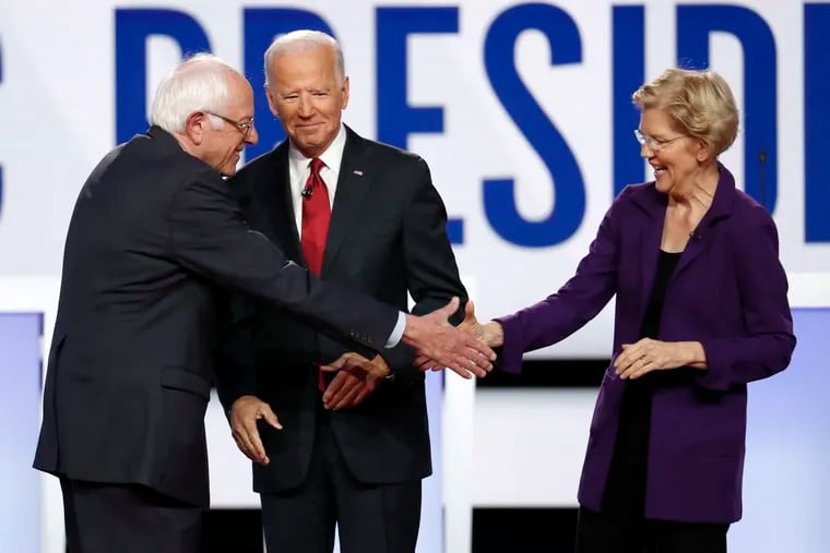 Democratic presidential candidate Sen. Bernie Sanders, I-Vt., left, former Vice President Joe Biden and Sen. Elizabeth Warren, D-Mass., right, participate in a Democratic presidential primary debate hosted by CNN/New York Times at Otterbein University, Tuesday, Oct. 15, 2019, in Westerville, Ohio.