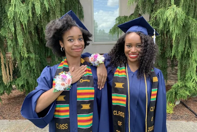 Jenice Armstrong's nieces celebrate their graduation from Howard University on Saturday at a socially-distant ceremony organized by their parents on the front lawn of their home.
