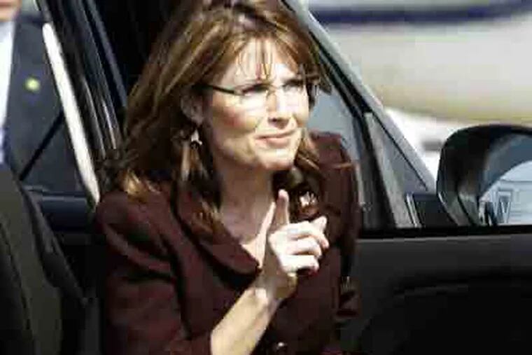 Sarah Palin  gets out of a SUV to board her campaign plane to leave Dallas