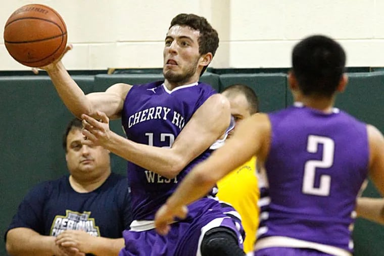 Cherry Hill West's Can Oztamur saves the ball from going out of bounds. (Ron Cortes/Staff Photographer)
