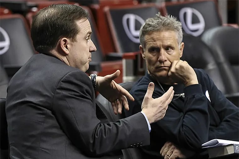 76ers general manager Sam Hinkie (left) and head coach Brett Brown (right). (Steven M. Falk/Staff Photographer)