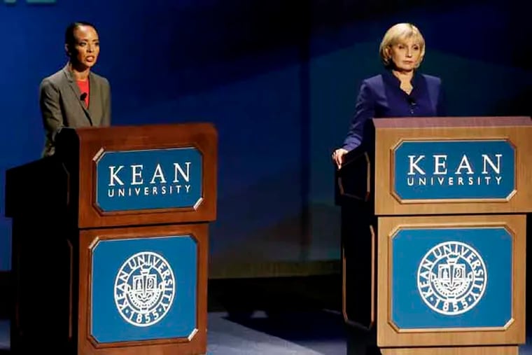 New Jersey Lt. Gov. Kim Guadagno, right, and Democrat Milly Silva debate at Kean University, Friday, Oct. 11, 2013, in Union, N.J. Guadagno, a former Monmouth County sheriff, has been Gov. Chris Christie's No. 2 since he successfully campaigned against then-Gov. Jon Corzine in 2009. Silva, who is running with Democrat Barbara Buono, is on the executive board of SEIU local 1199, a union representing 7,000 nursing home and health care workers. (AP Photo/Julio Cortez)