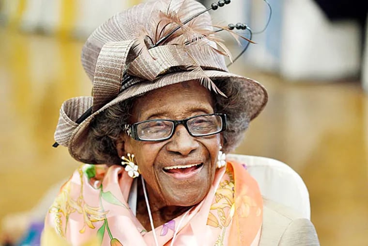 Anna Henderson was dressed to the nines for the 2012 centenarian luncheon. Her famous smile completed any outfit. (David Maialetti/Staff/File)