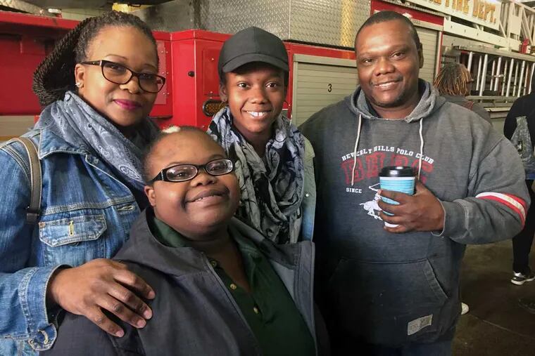 The Woods Family of East Germantown votes together at their polling station. From left:  Darlene (Jean jacket), Dejah (glasses), Jessica, and Andrew.