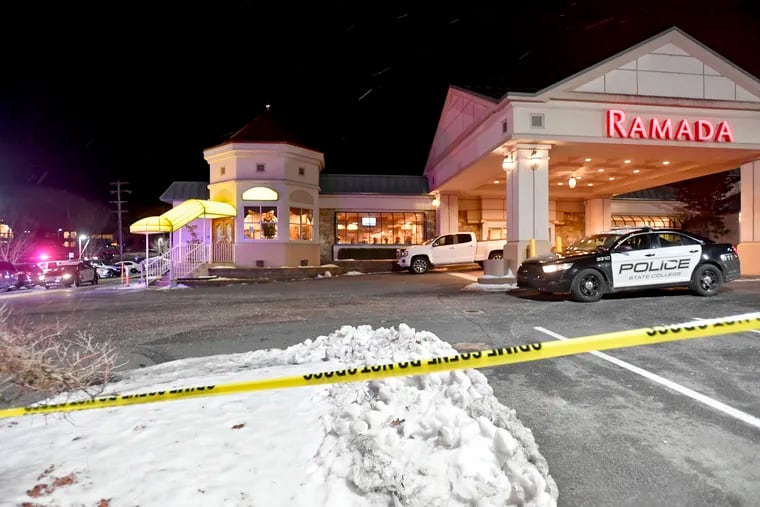 State College Police respond to a shooting at P.J. Harrigan's Bar & Grill at the Ramada Inn Thursday, Jan. 24, 2019, in State College, Pa. (Abby Drey/Centre Daily Times via AP)