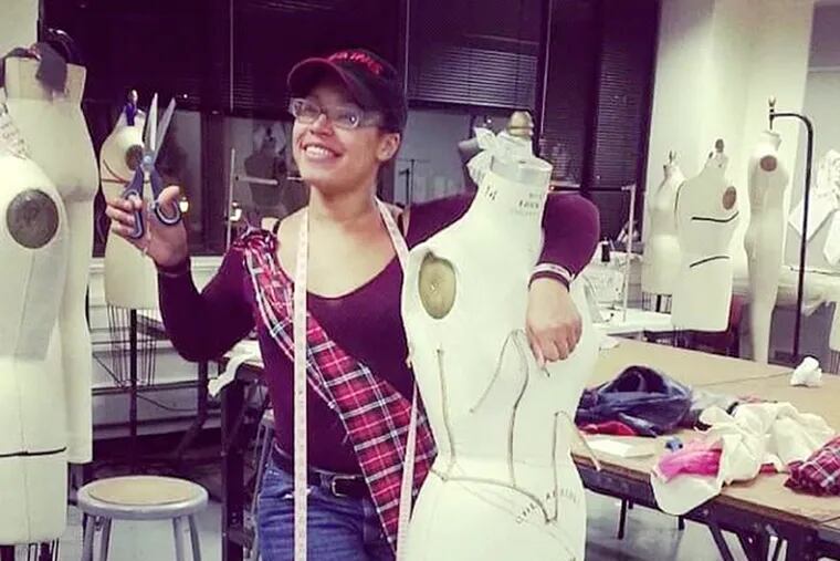 Briana Bailey won a Mummers fashion design competition at the Art Institute of Philadelphia by creating the costume that the Greater Overbrook String Band captain will wear in the New Year's Day Mummers Parade.