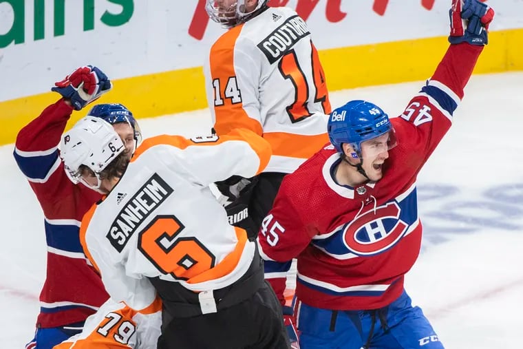 Montreal Canadiens' Laurent Dauphin scores the tying goal against the Flyers Thursday. The Habs went on to win 3-2 in a shootout.