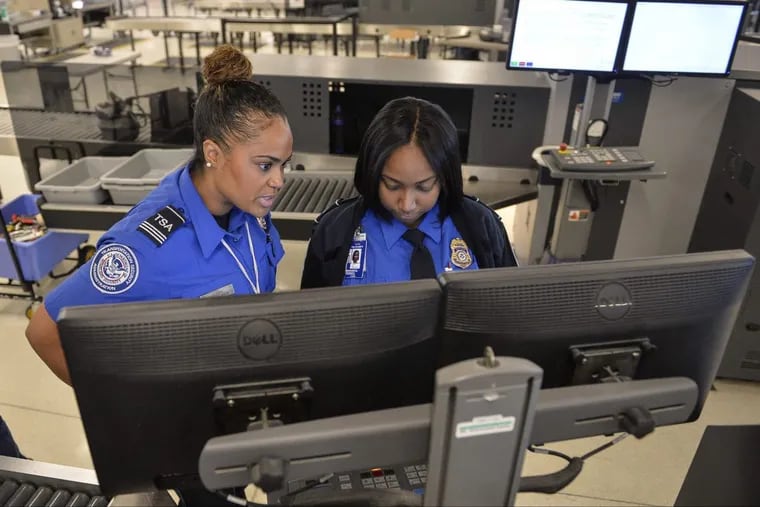 TSA officers at Philadelphia International Airport in a May 24, 2016, file photograph.