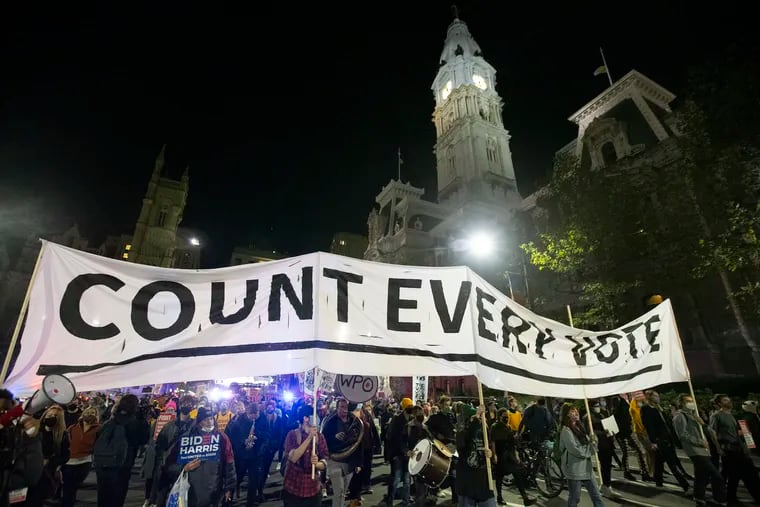 Demonstrators gather on Nov. 4 outside Philadelphia City Hall.