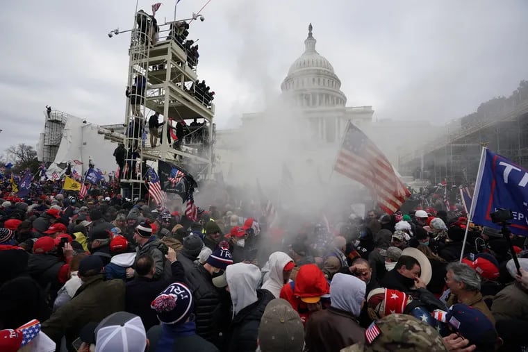 Trump supporters riot at the Capitol during last week's insurrection.