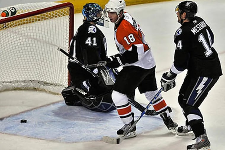 Mike Richards (above) and Blair Betts scored two goals in the Flyers' win on Wednesday night. (Steve Nesius/AP)