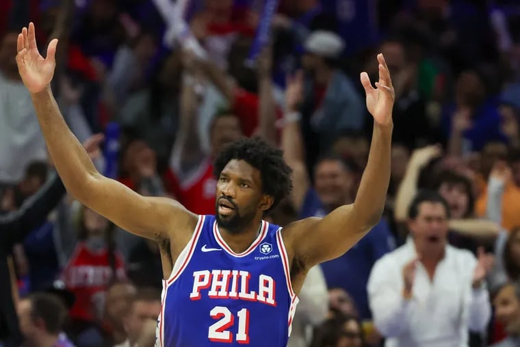 Sixers Joel Embiid celebrates a three-pointer in the fourth quarter in Game 3 of the first-round playoff series at the Wells Fargo Center on Thursday, April 25, 2024, in Philadelphia.