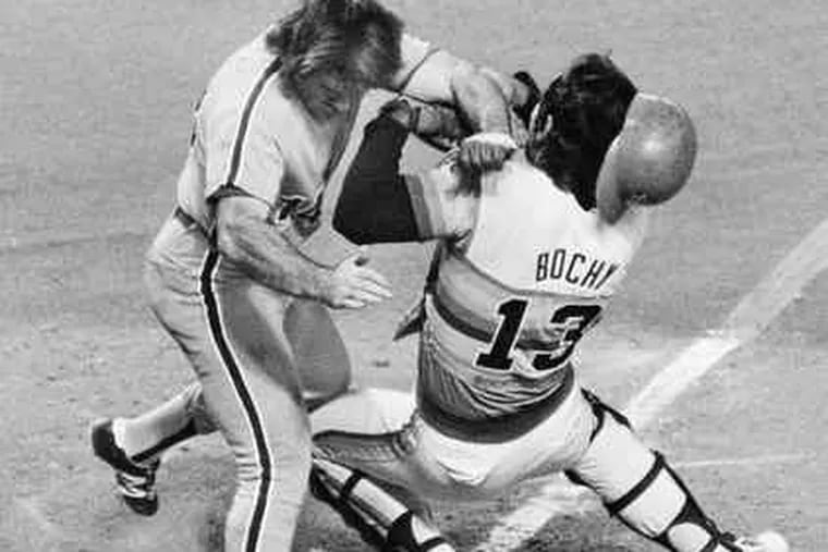 The Phillies' Pete Rose running over Astros catcher Bruce Bochy in the 1980 NLCS.