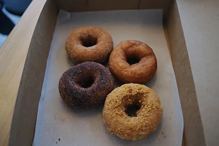 The doughnuts: (Clockwise from left): Appolonia, Chile Lime, Honey Glazed, Key Lime. (SARAH J. GLOVER / Staff Photographer)