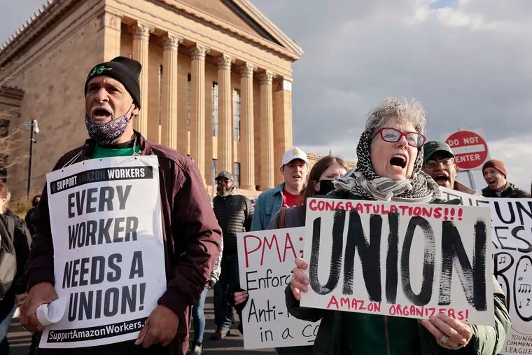 Cindy Lou (right) and others are vocal in their support during a rally for art museum workers at the Philadelphia Museum of Art on April 1, 2022. Museum workers voted to unionize in 2020 and are frustrated by the lack of progress in talks with management.