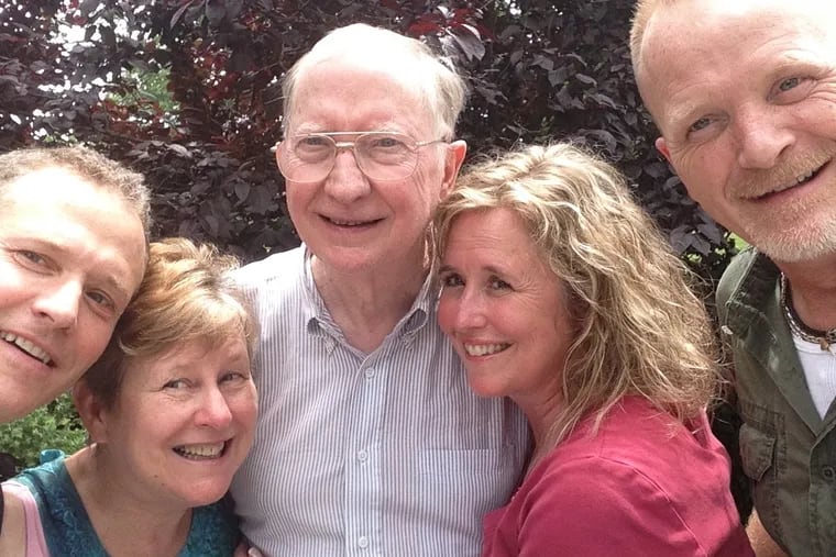 Professor Coombs (center) stands with his family, from left to right, son Jesse, wife Rosalie, daughter Sheila, and son Tom. He made it a point to stay connected to his children and wife.