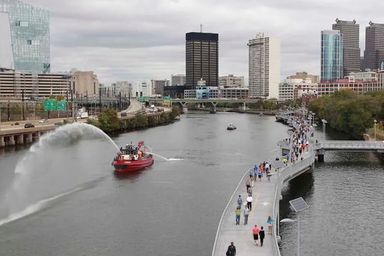 The Schuylkill Banks boardwalk extends the river trail from Locust Street to the South Street Bridge. 10/02/2014 ( MICHAEL BRYANT  / Staff Photographer )