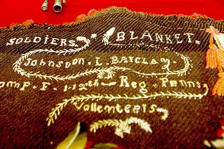 A blanket carried in the Civil War by John L. Barclay of Company F of 112th Pa.. (c. 1862).