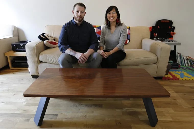 David and Virginia Salonen relocated from Brooklyn to East Kensington. Their home is decorated with furniture that David designed, including the living room coffee table.