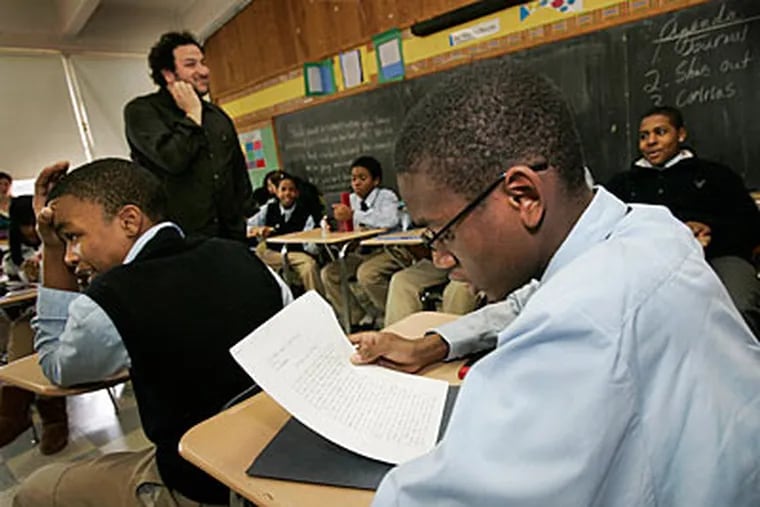 Christopher Jones reads his work during his "Voices of Teens"
writing class at Amy Northwest Middle School in the East Oak Lane
section of Philadelphia. (Alejandro A. Alvarez / Staff Photographer )