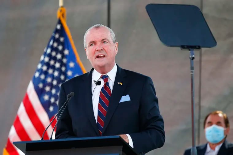 New Jersey Gov. Phil Murphy, photographed here during his 2021 budget address, announced Sunday that the first vaccines will be administered in the Garden State on Tuesday.